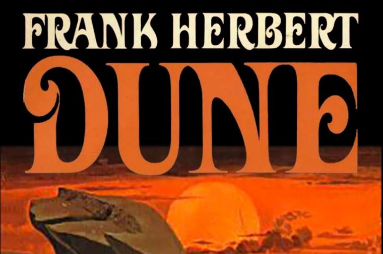 Cover of Frank Herbert's Dune. The title is written over a red sun with a giant sand worm in the foreground